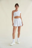 Avery Smoothing Flare Tennis Skort in White