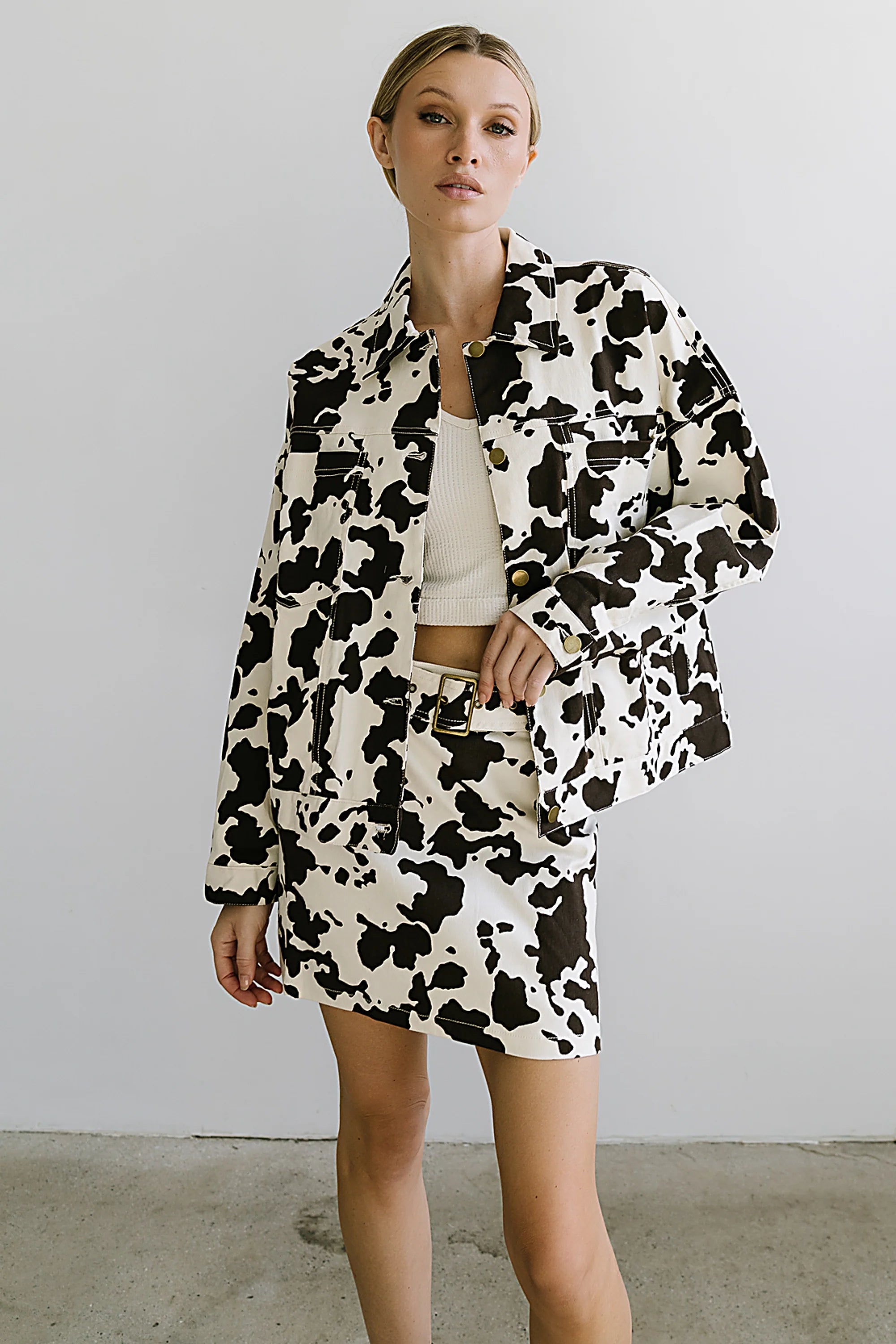 Tasha Cow Print Mini Skirt